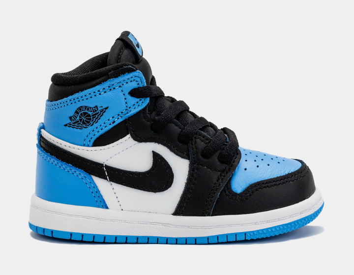 Black jordans hotsell with blue logo