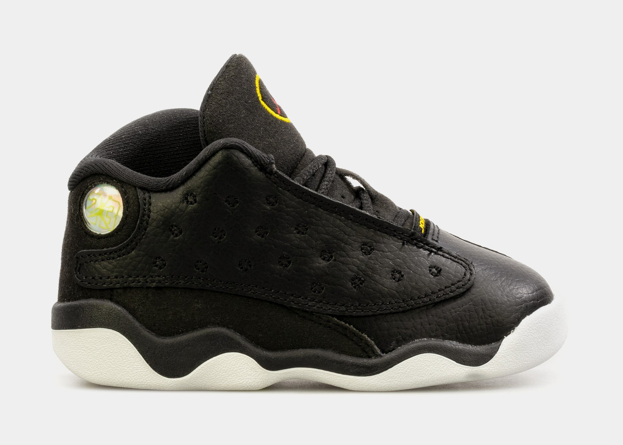 Jordan retro 13 black and yellow on sale