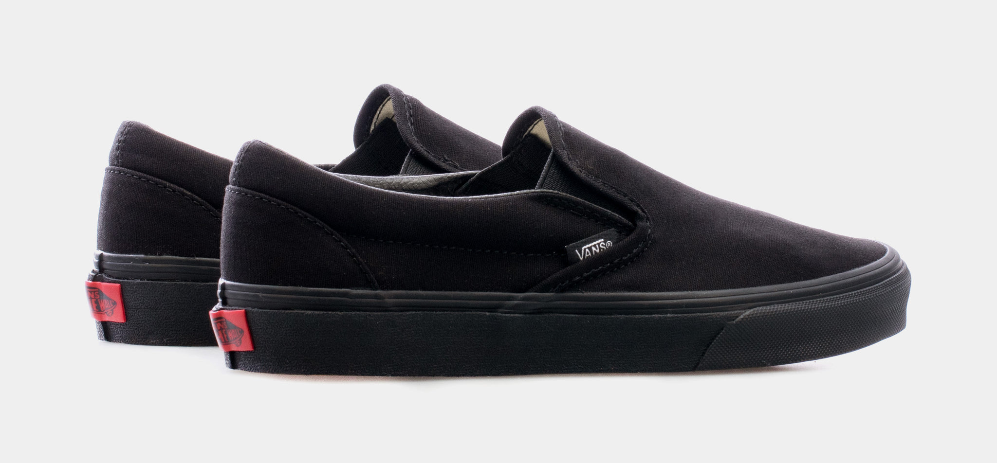 Black slip on vans on clearance sale