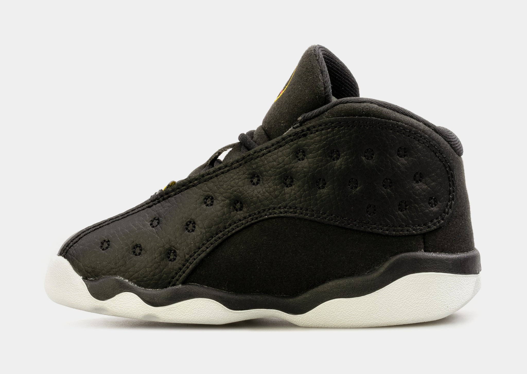 Jordan retro 13 shop black and gold