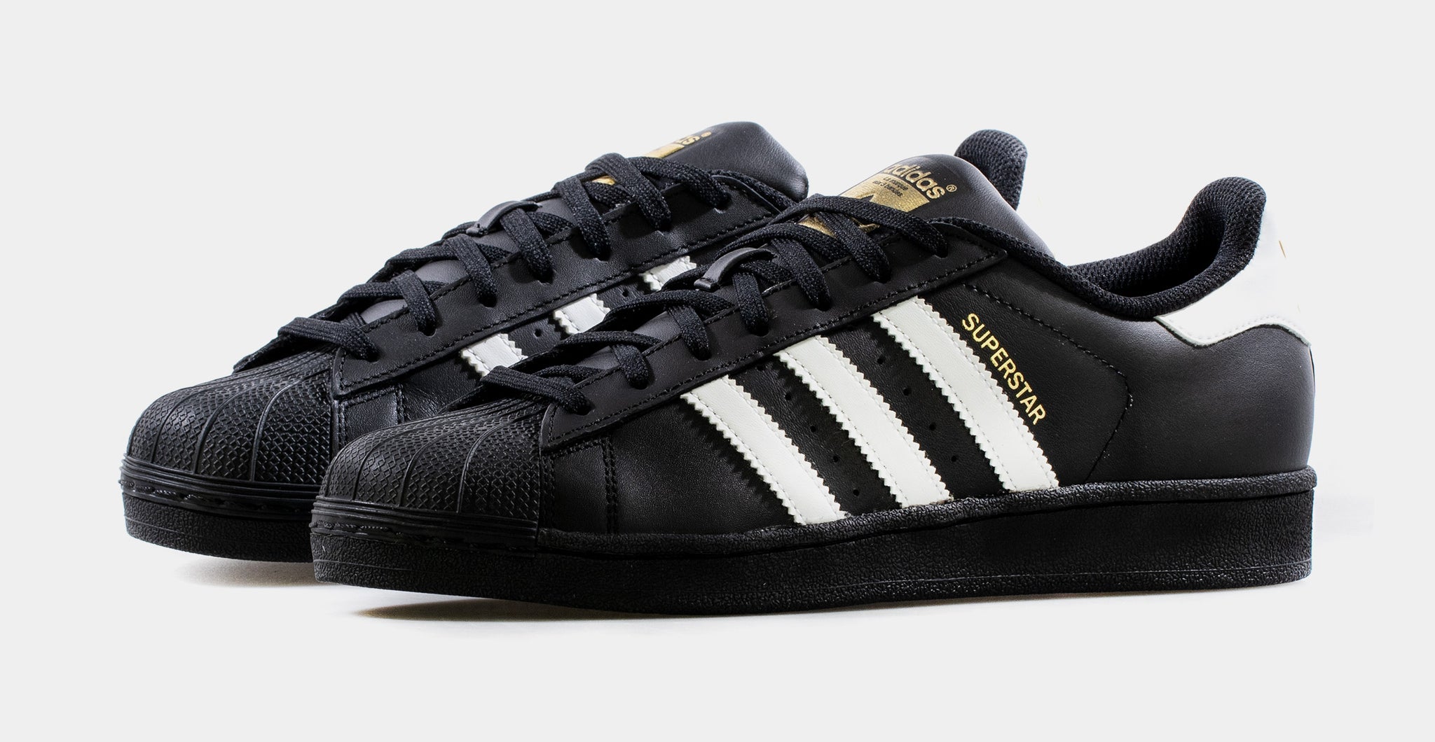 Black and gold adidas shell outlet toes