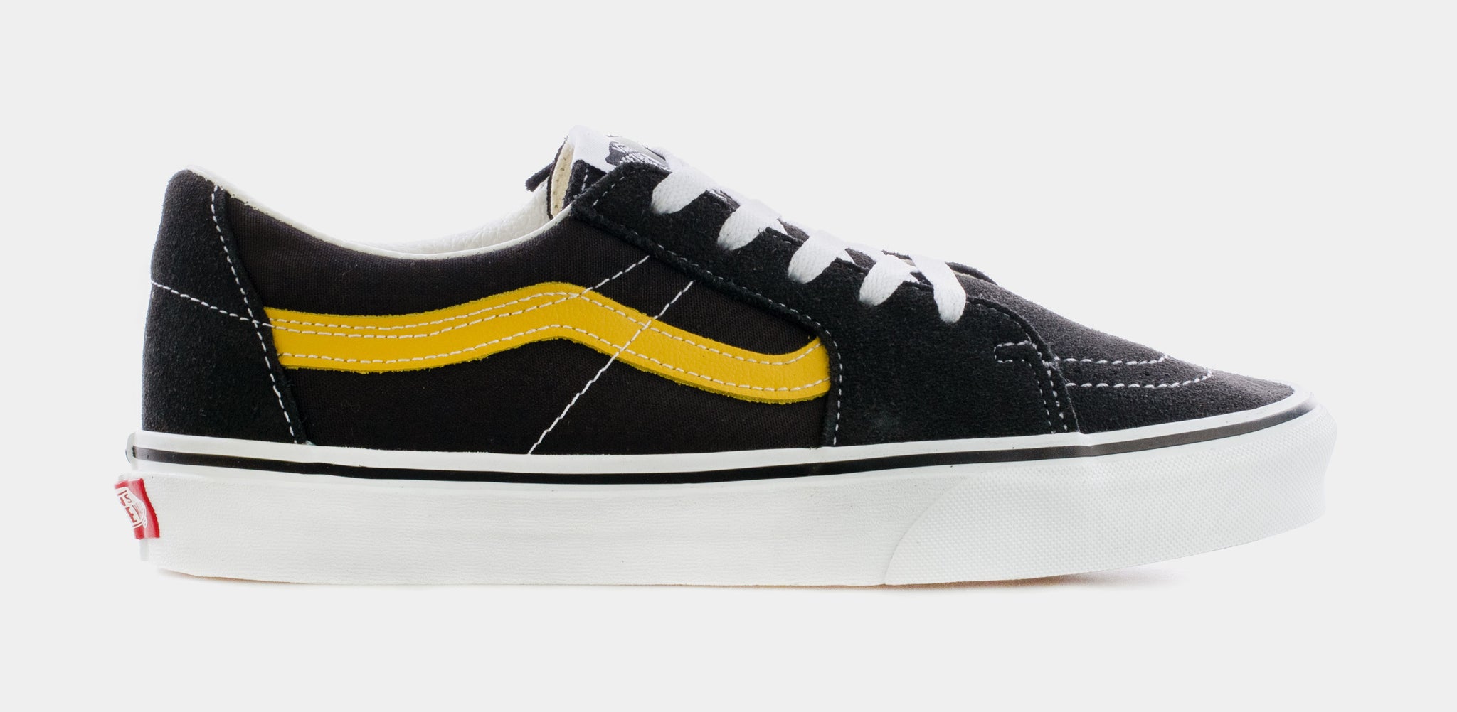 Black and store yellow skate shoes