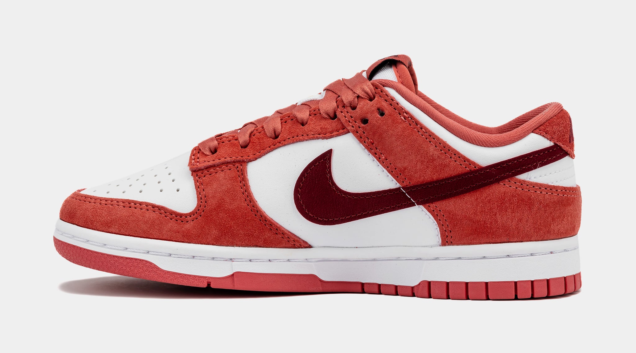red and white low dunks