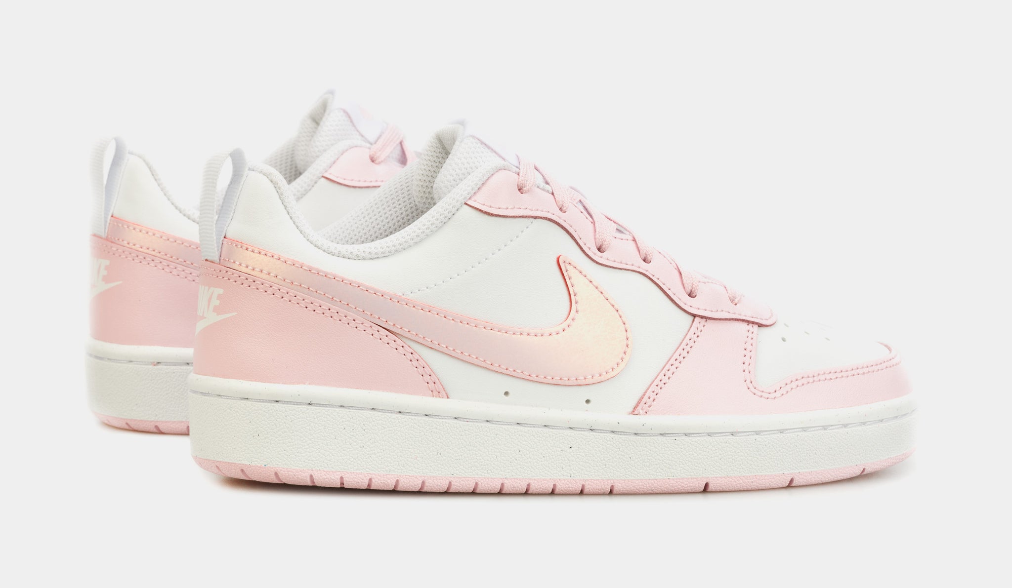 Pink and sales white nike shoes