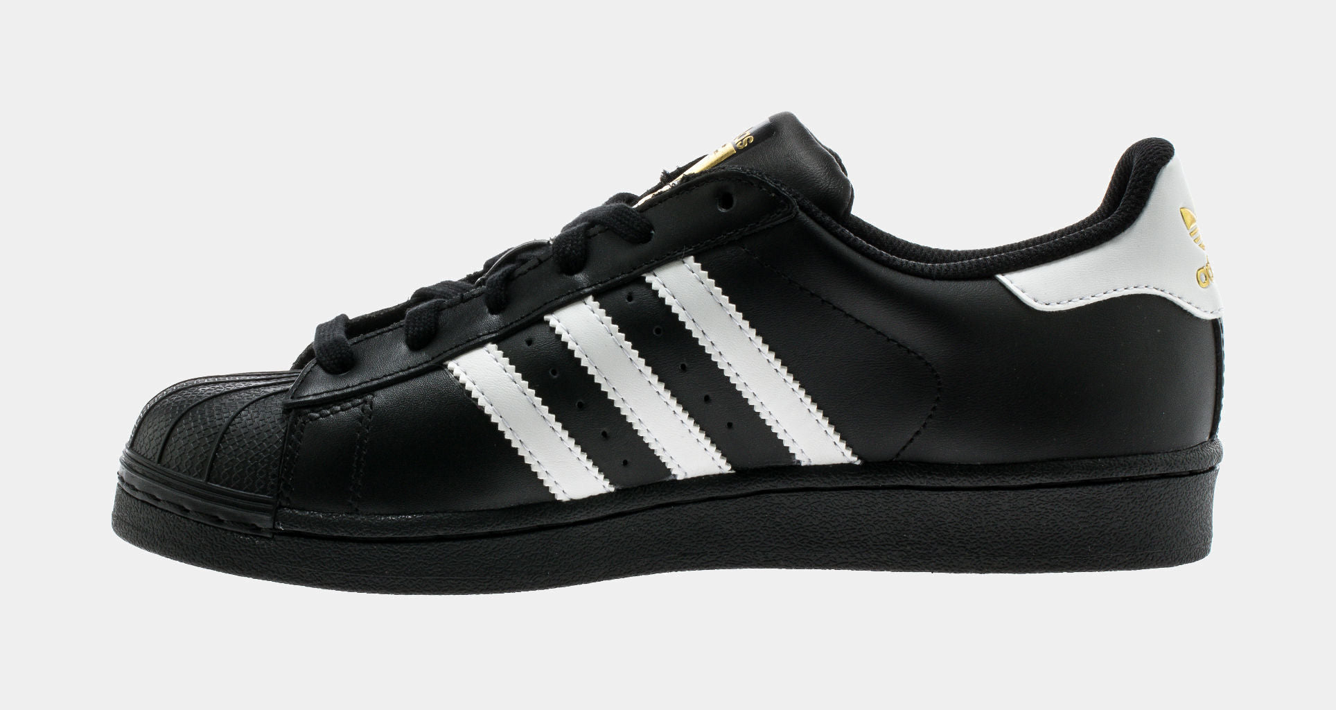 London, England, 05/05/2018 Adidas Superstar Shell Toe Originals Hip Hop  Style Vintage Sneaker Trainers. All Black Adidas Superstar Trainers,  Stylish Retro New York Street Fashion. Stock Photo, Picture and Royalty  Free Image.