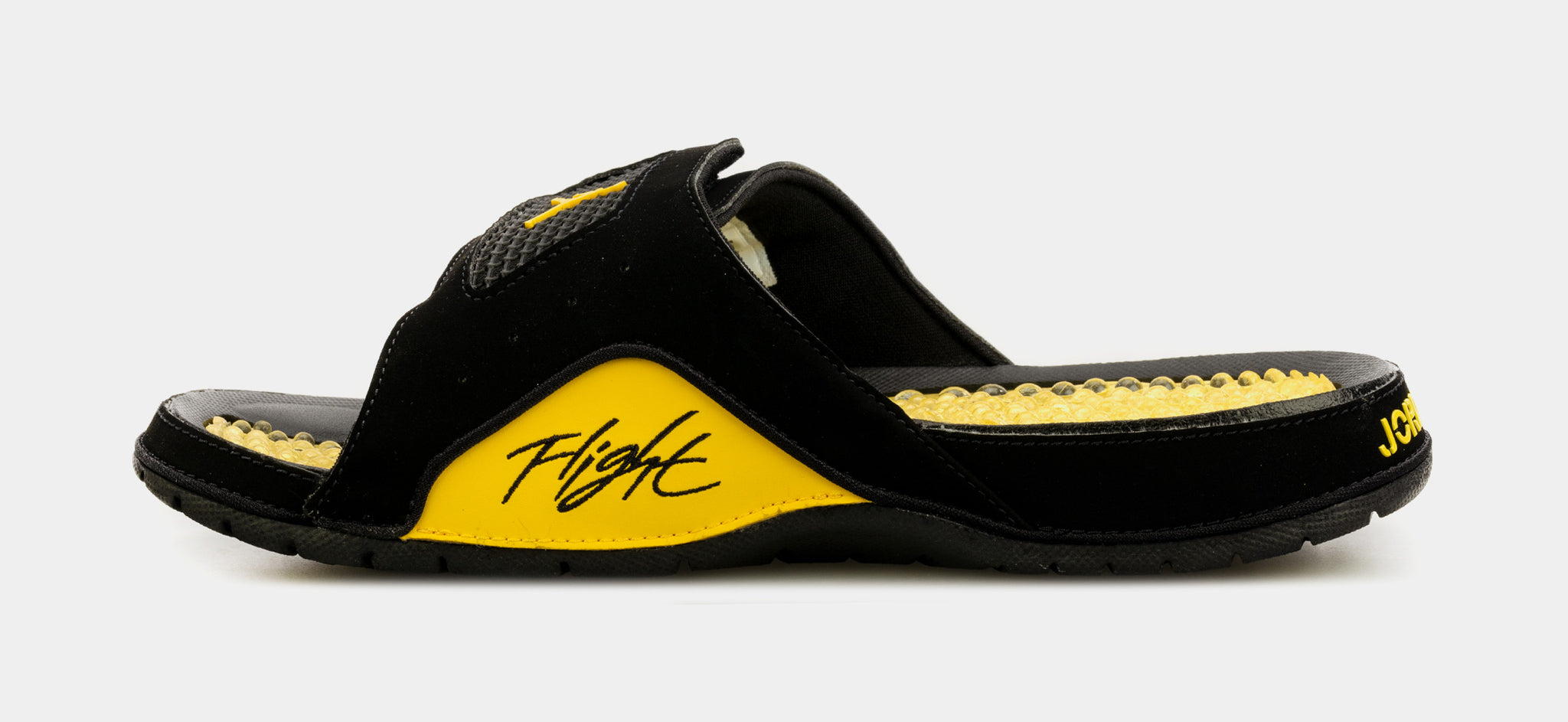 Black and shop gold jordan sandals